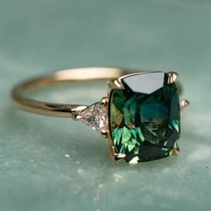 Emerald Essence: 14K Gold Plated Ring with Green CZ Gemstone